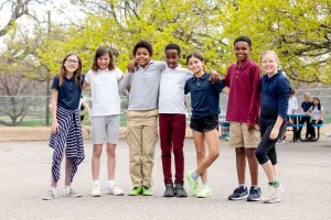 DPS Students with arms around eachother