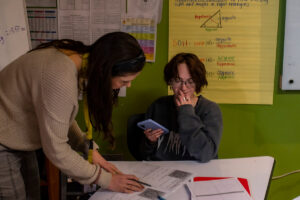 Student with cell phone in class